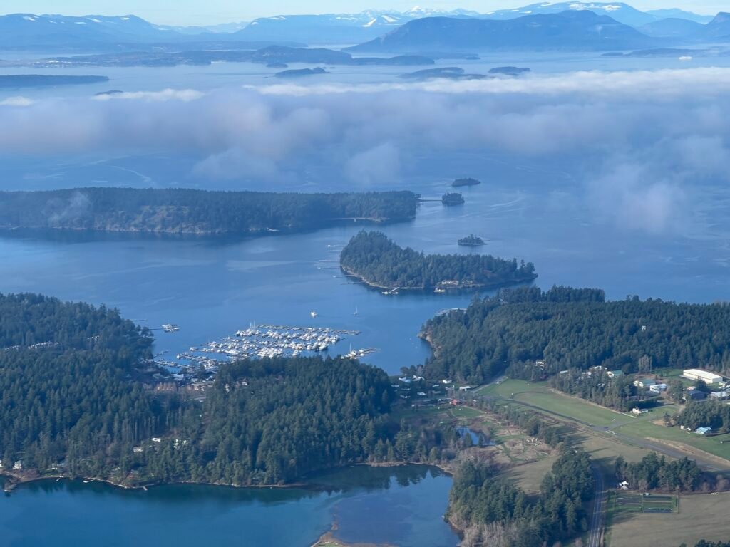 Aerial view of Roche Harbor - the harbor itself, and also the airport near the bottom right.
