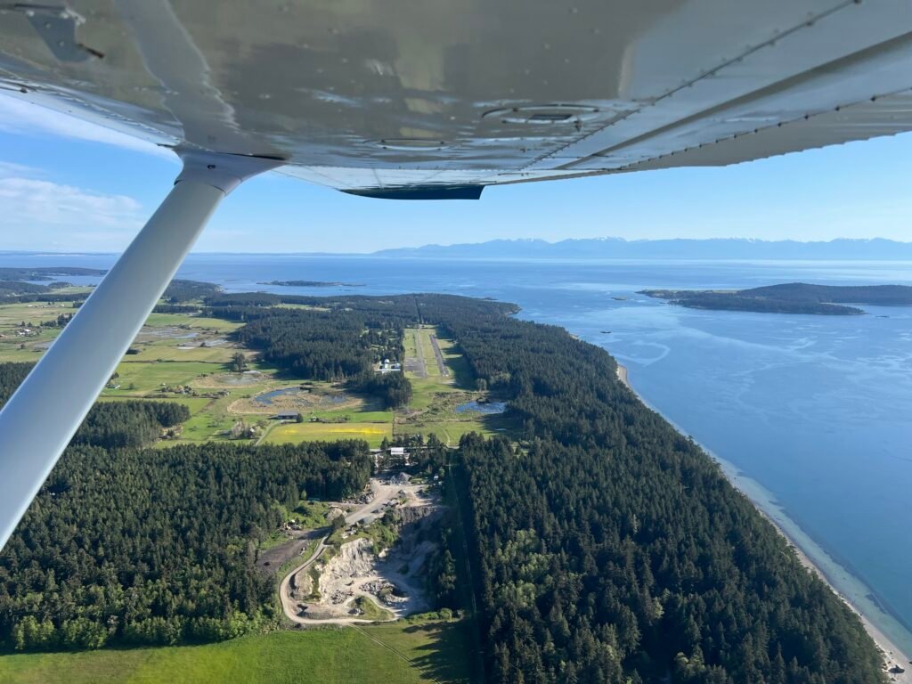 Aerial approach to Lopez Island airport from the north