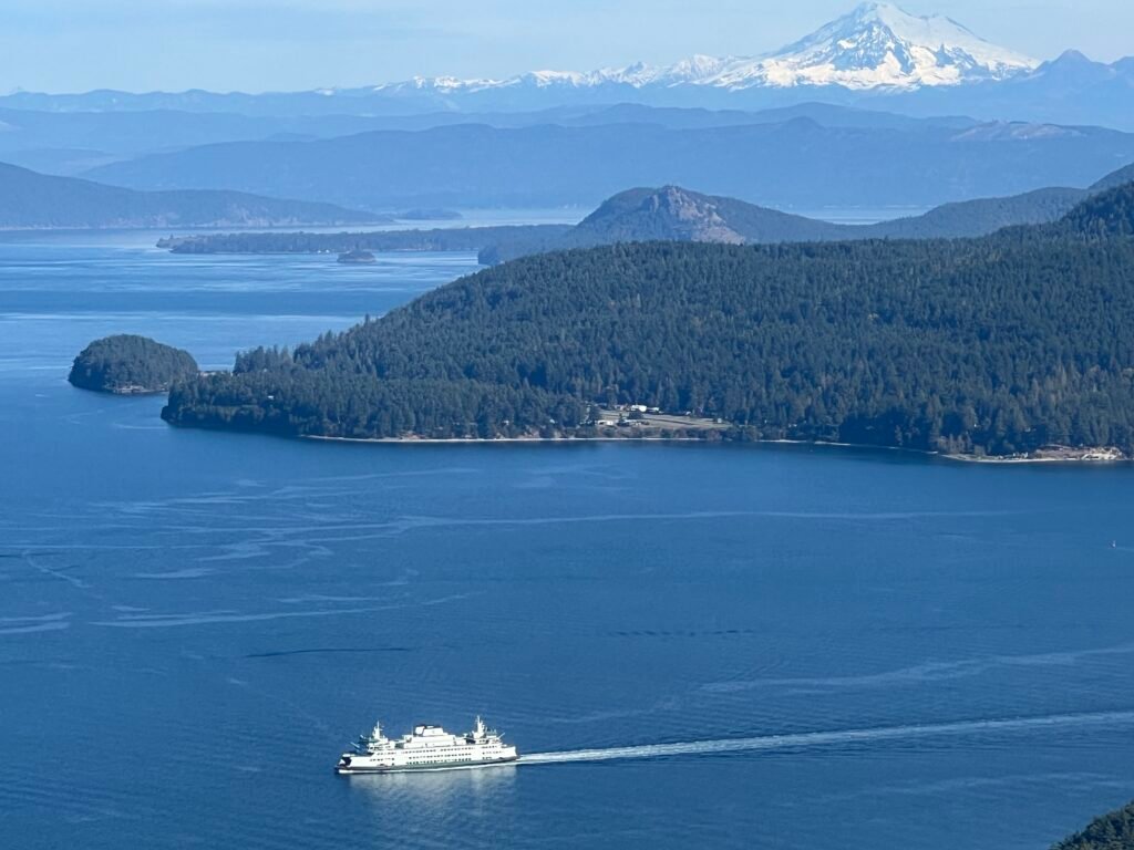 A ferry and  mt baker from the san juans
